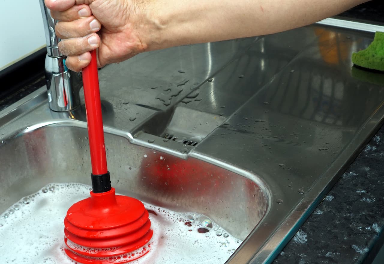 Thumbnail-For-Why Your Drain Keeps Clogging and How to Fix It for Good-By-EZ Flow Plumbing